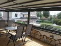Terrasse wind- und regengeschützt